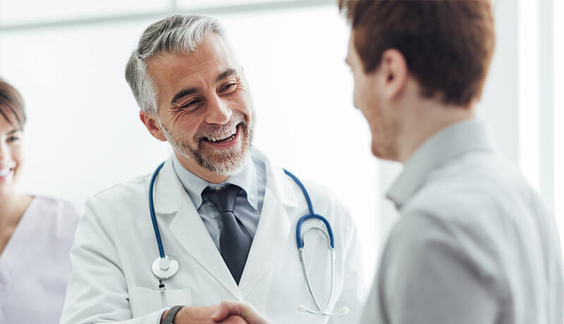 HOMED medical doctor welcoming a patient