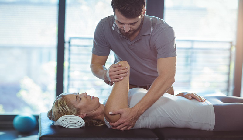 HOMED physiotherapist treats shoulder dislocation Shoulder Dislocation Upper arm bone dislocation on-Surgical Reduction Techniques and Pain Management