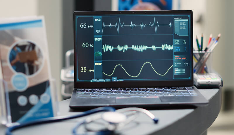 Heartbeat on laptop at empty front desk