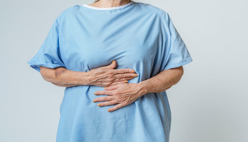 Senior patient having a stomach ache