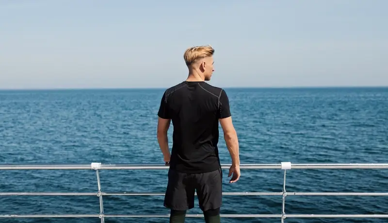 A man who is doing sports in the ship